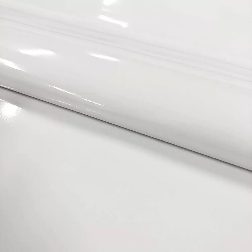Sintético Verniz Espessura 0.35mm Fundo Malha de Poliéster 1,40m Largura - Branco Sintético Verniz Espessura 0.35mm Fundo Malha de Poliéster 1,40m Largura - Branco