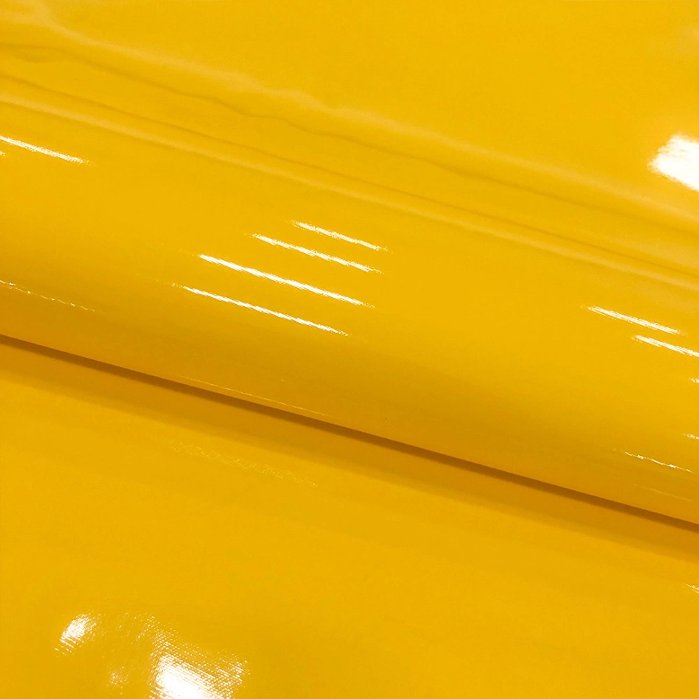 Sintético Verniz Espessura 0.35mm Fundo Malha de Poliéster 1,40m Largura - Amarelo Sintético Verniz Espessura 0.35mm Fundo Malha de Poliéster 1,40m Largura - Amarelo