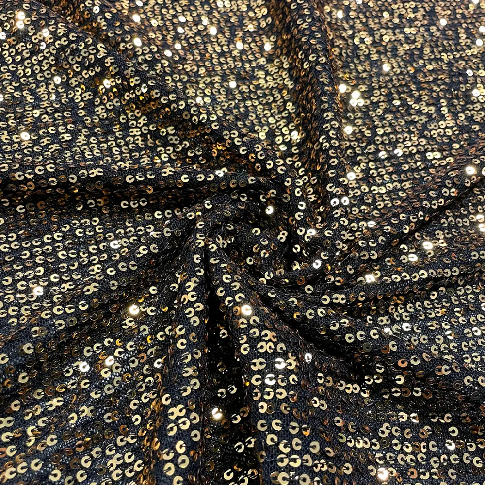 Tecido Paetê Bordado 98% Poliéster 2% Elastano 1,30m Largura - (f)preto (b)dourado Tecido Paetê Bordado 98% Poliéster 2% Elastano 1,30m Largura - (f)preto (b)dourado